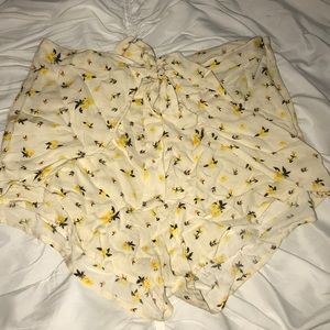 Tan shorts with yellow floral pattern!